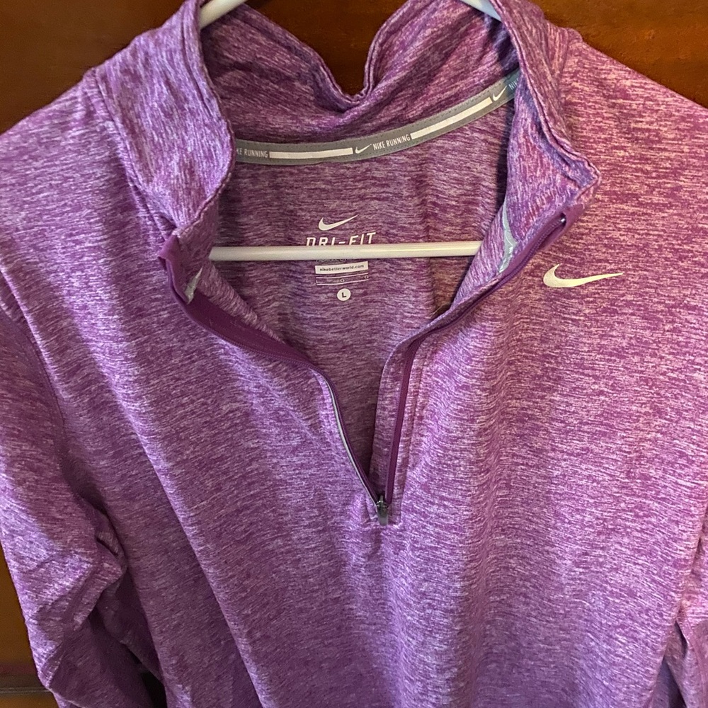 Never worn Nike Purple Dri-Wear quarter zip up.
